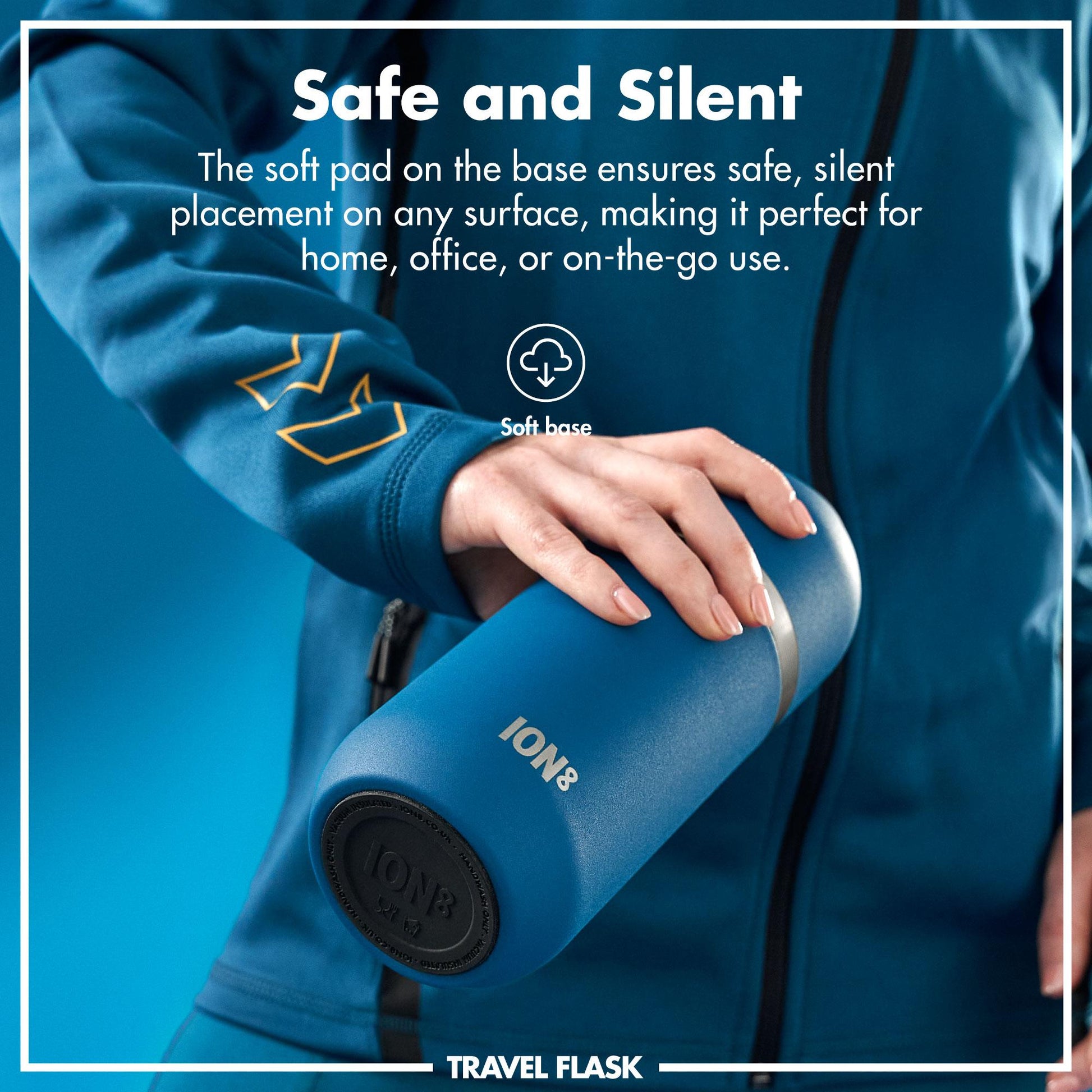 Person holding a blue ION8 travel flask with text about its safe and silent design.